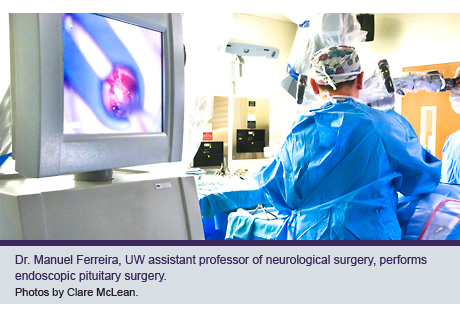 Dr. Manuel Ferreira, UW assistant professor of neurological surgery, performs endoscopic pituitary surgery.